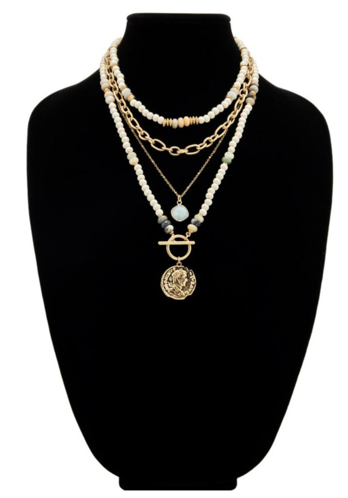 The layered medallion necklace