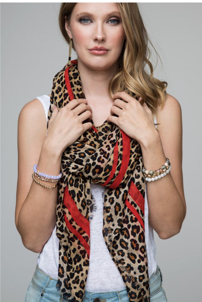 Leopard scarf with red accent