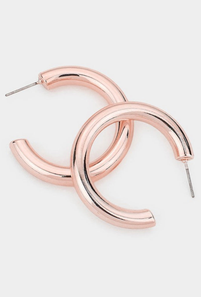 Light pink colored hoop earrings